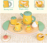 Pink pretend tea set with wooden cups and teapot