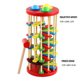 Educational knock and roll toy for sensory and motor skill development

